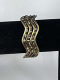 Brass and Bead Bangle. Very Different.