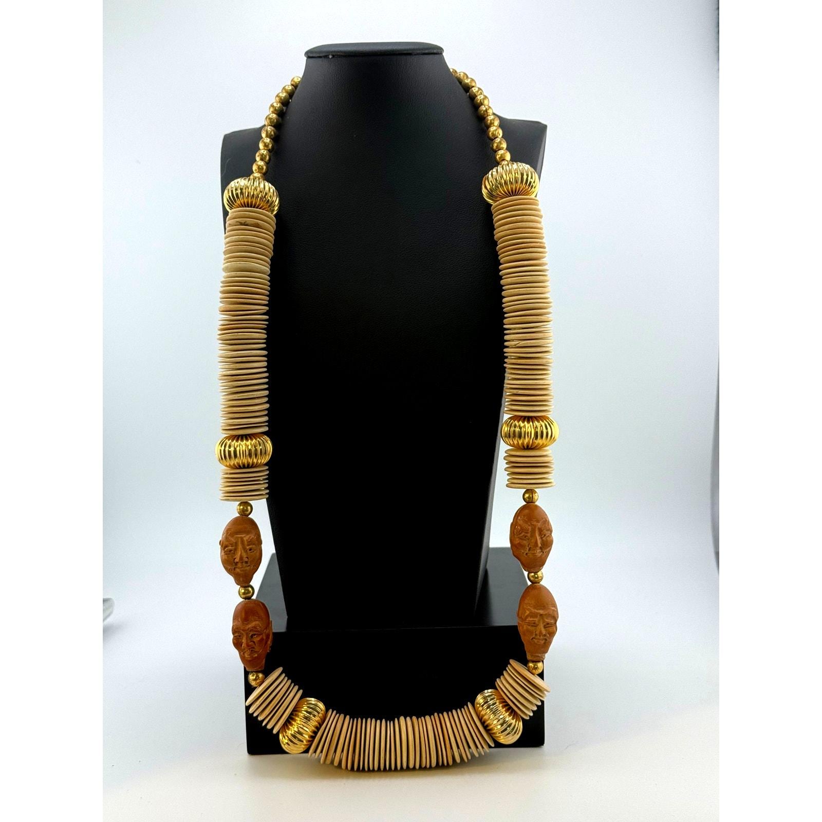 Wood Crafted Disk Carved Heads Necklace