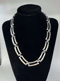 Silver Tone Necklace. Very bright and modern.