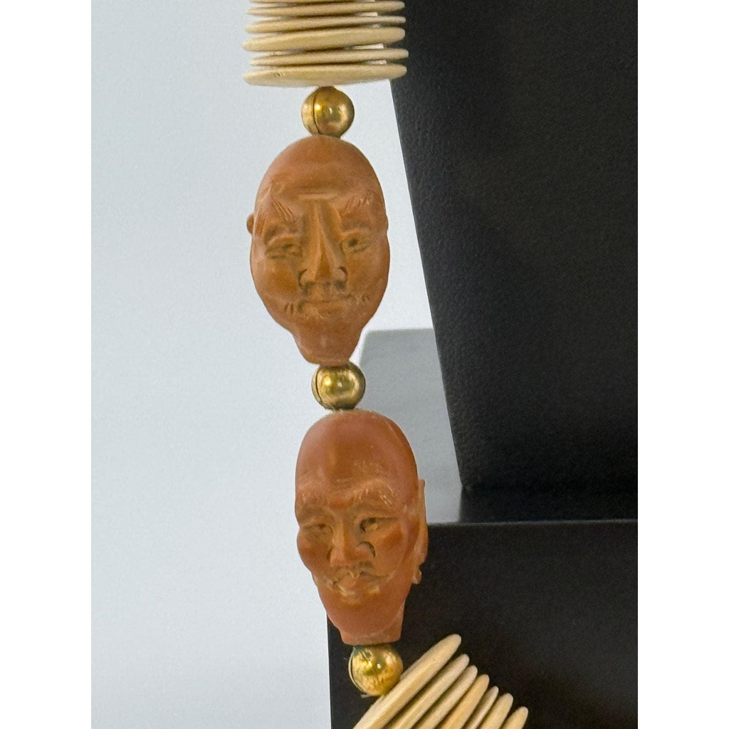 Wood Crafted Disk Carved Heads Necklace