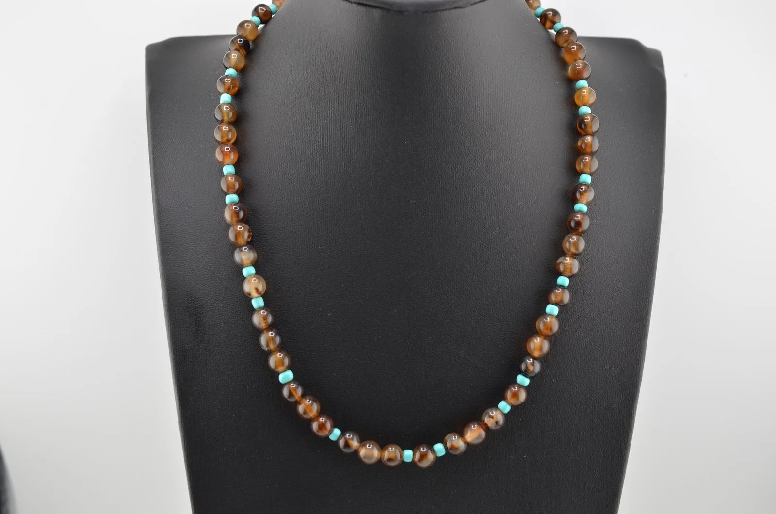 Navajo Mary W. Roanhorse Carved Brown Agate and Glass Necklace