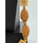 Wood Crafted Disk Carved Heads Necklace