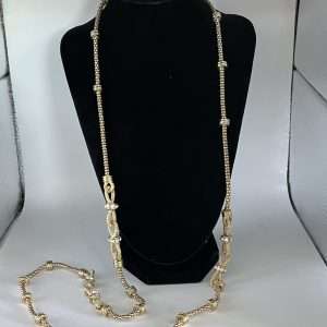 Very Long Gold Tone Necklace with Bows and Simulated Diamonds