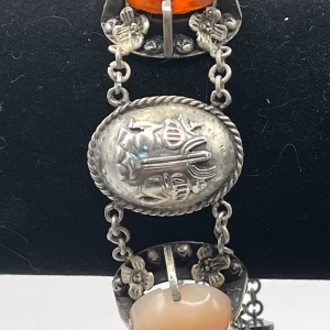 Vintage Sterling Bracelet with Gemstones and Intricate Detailing